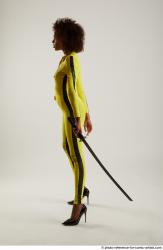 Woman Adult Average Black Fighting with sword Standing poses Casual